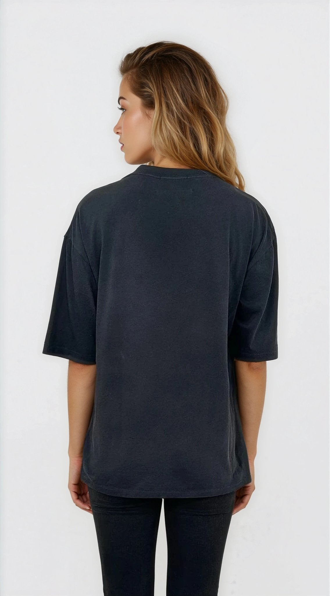 Person wearing a dark blue t-shirt on a white background