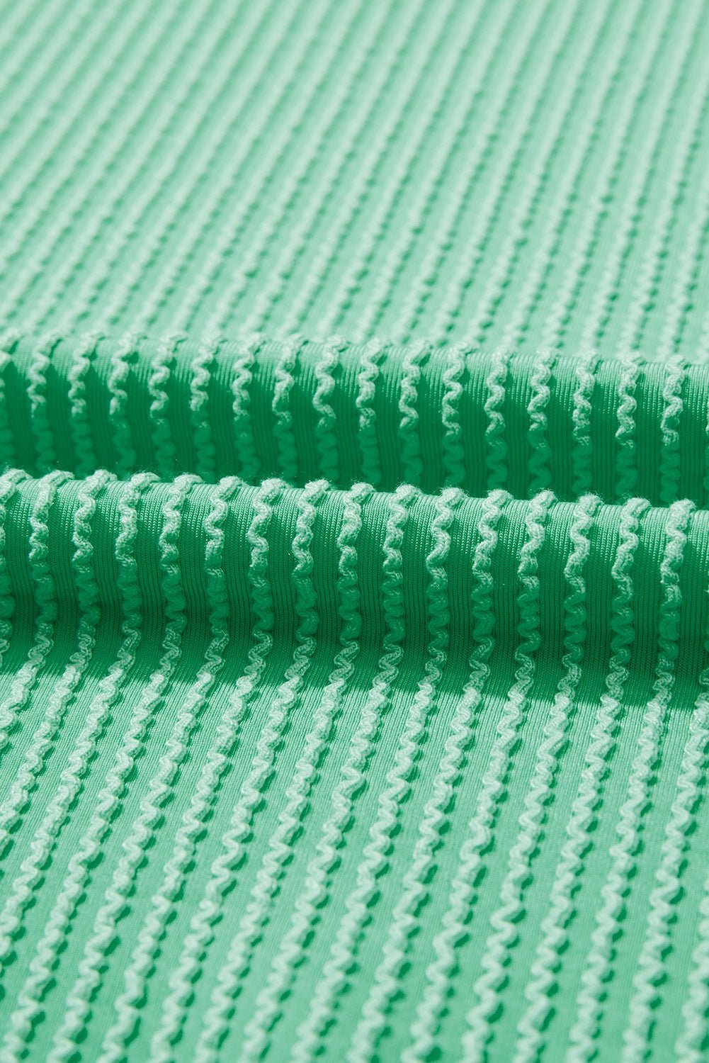 Close-up of green textured fabric