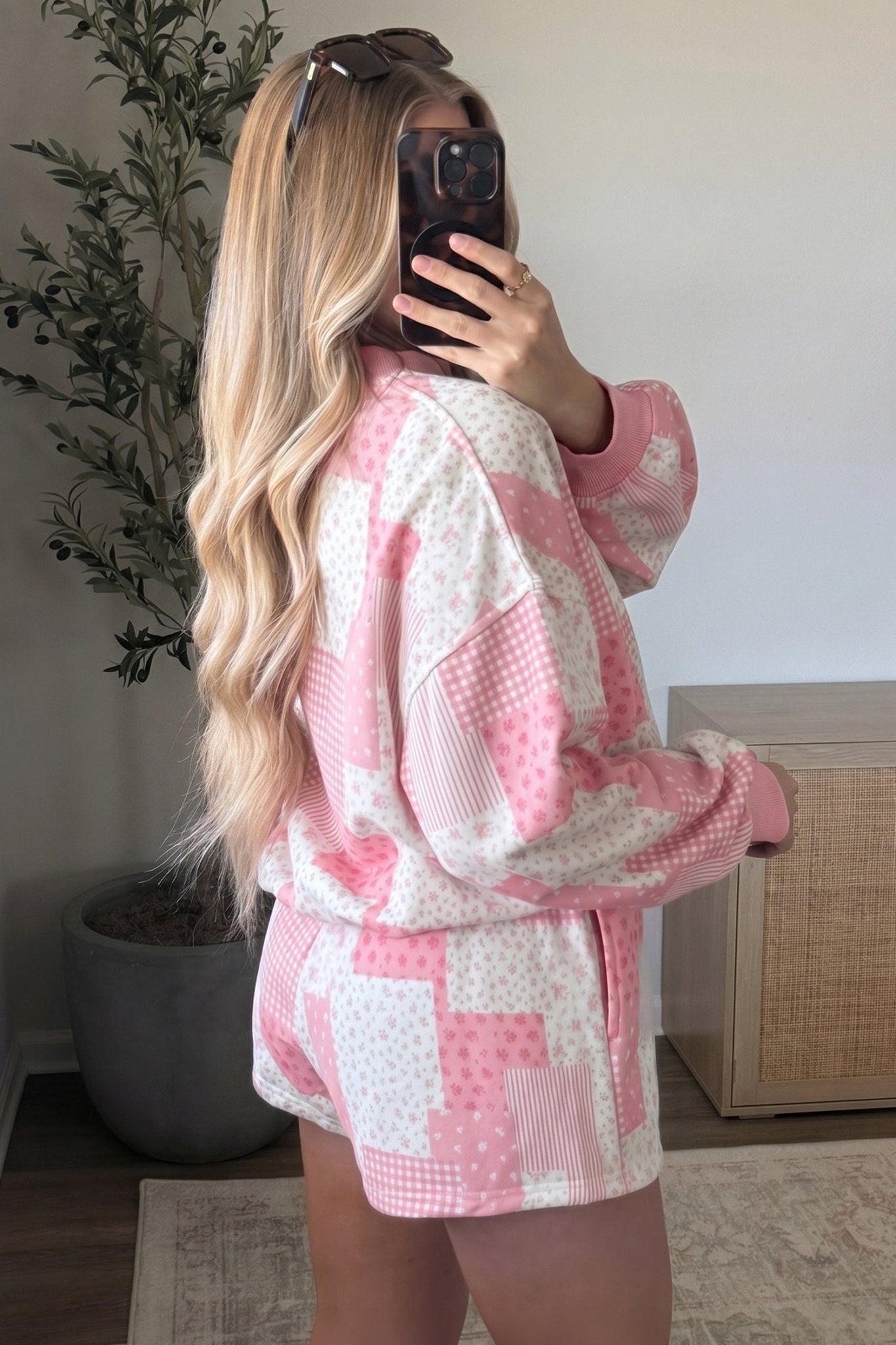 Pink ditsy floral and check patchwork oversized lounge sweatshirt and mini shorts mirror selfie.