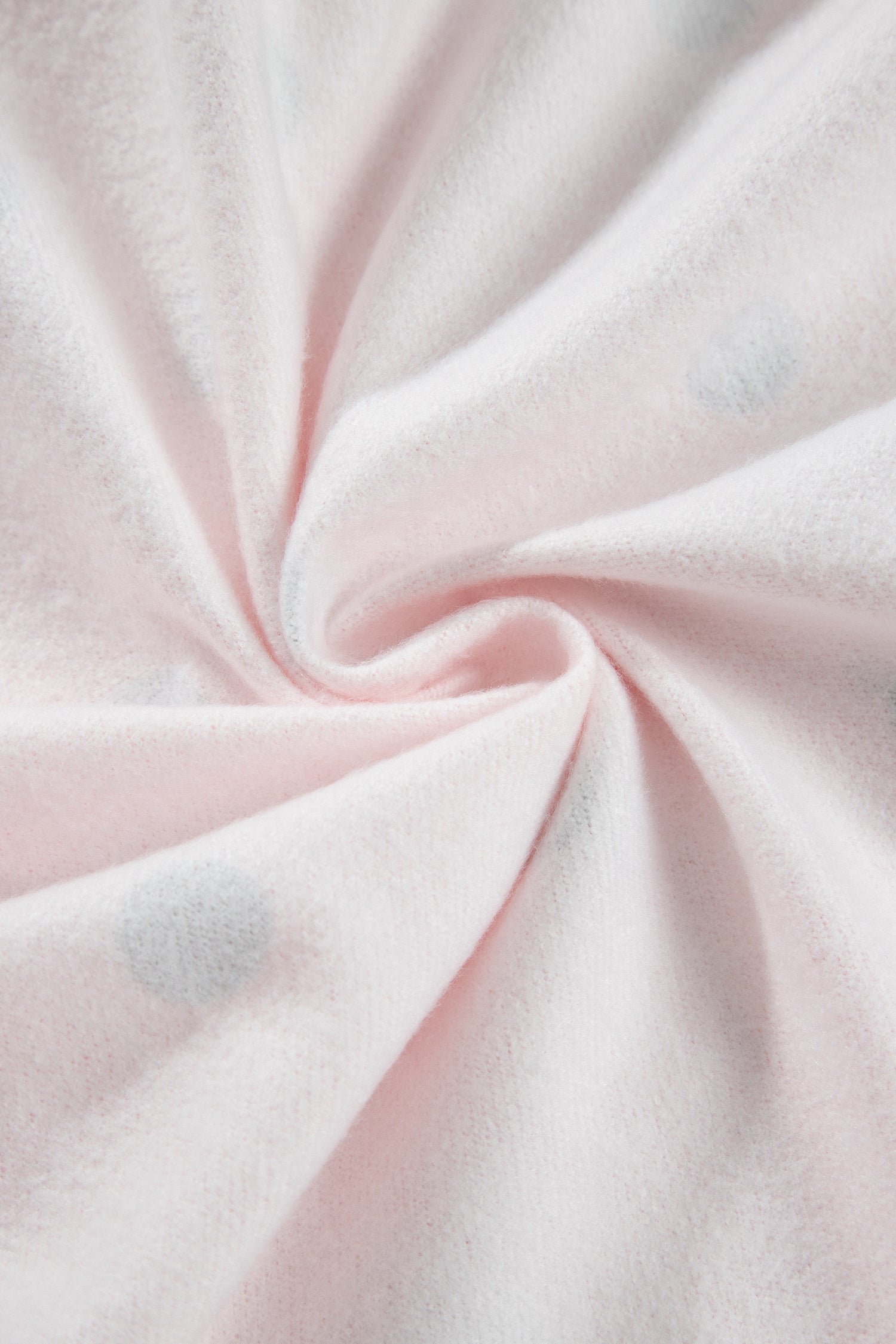 Soft inner fabric of pink polka dot lounge set, close-up
