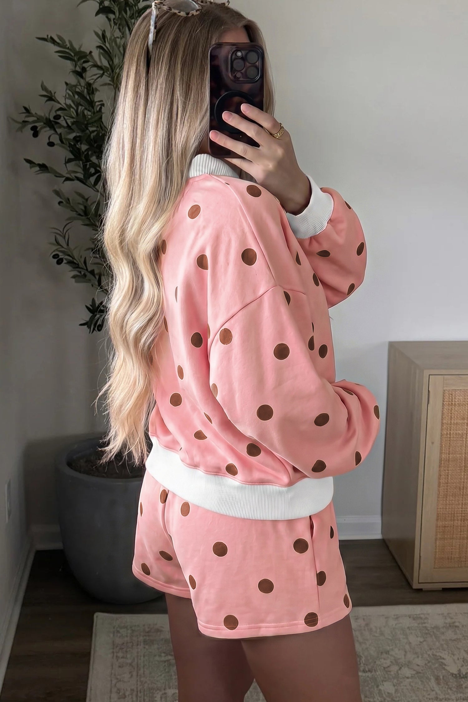 Pink polka dot lounge set, side view on model