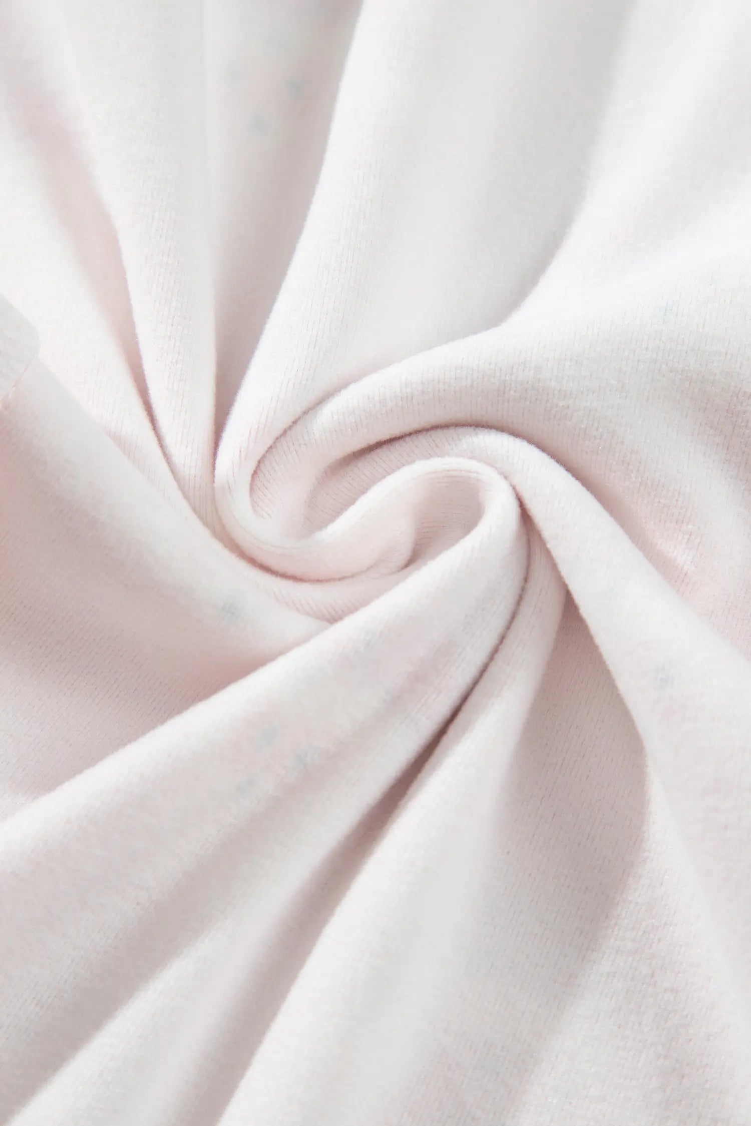 Close-up of soft, smooth knit fabric texture