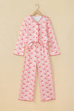 Pink Santa print button front top and wide leg pants set on a hanger, front view