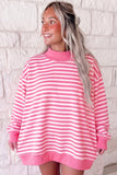 Women's pink stripe oversized sweatshirt with ribbed mock neck