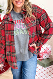 A woman wearing a red and green plaid flannel button-up shirt over a gray graphic sweatshirt that reads 'HOLY MOLY MAM' in pink and green letters, paired with blue jeans. The background shows a cozy holiday setting with wrapped gifts and a stocking.