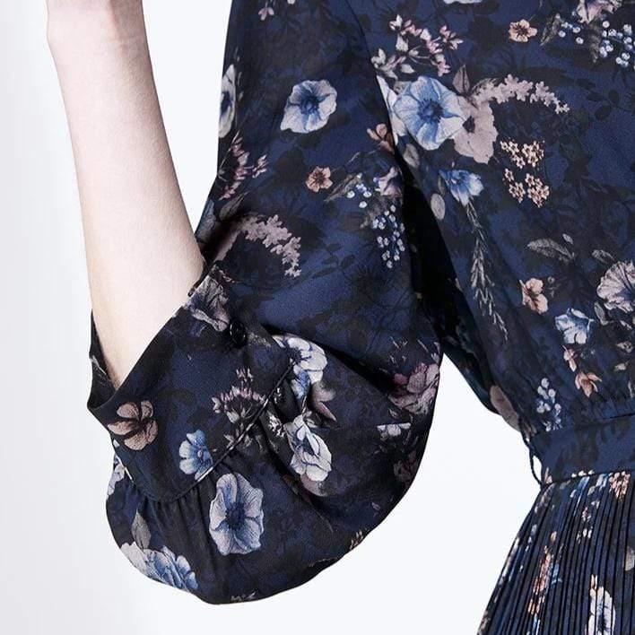Navy blue floral dress with white background