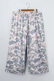 Pink, gray, and white camouflage cropped wide-leg pants with elastic waistband.