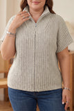 Plus size light gray chunky ribbed knit zip up short sleeve sweater with collar and blue jeans