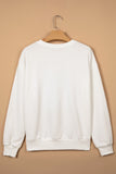 Back view of white crew neck Christmas sweatshirt with ribbed cuffs on a hanger