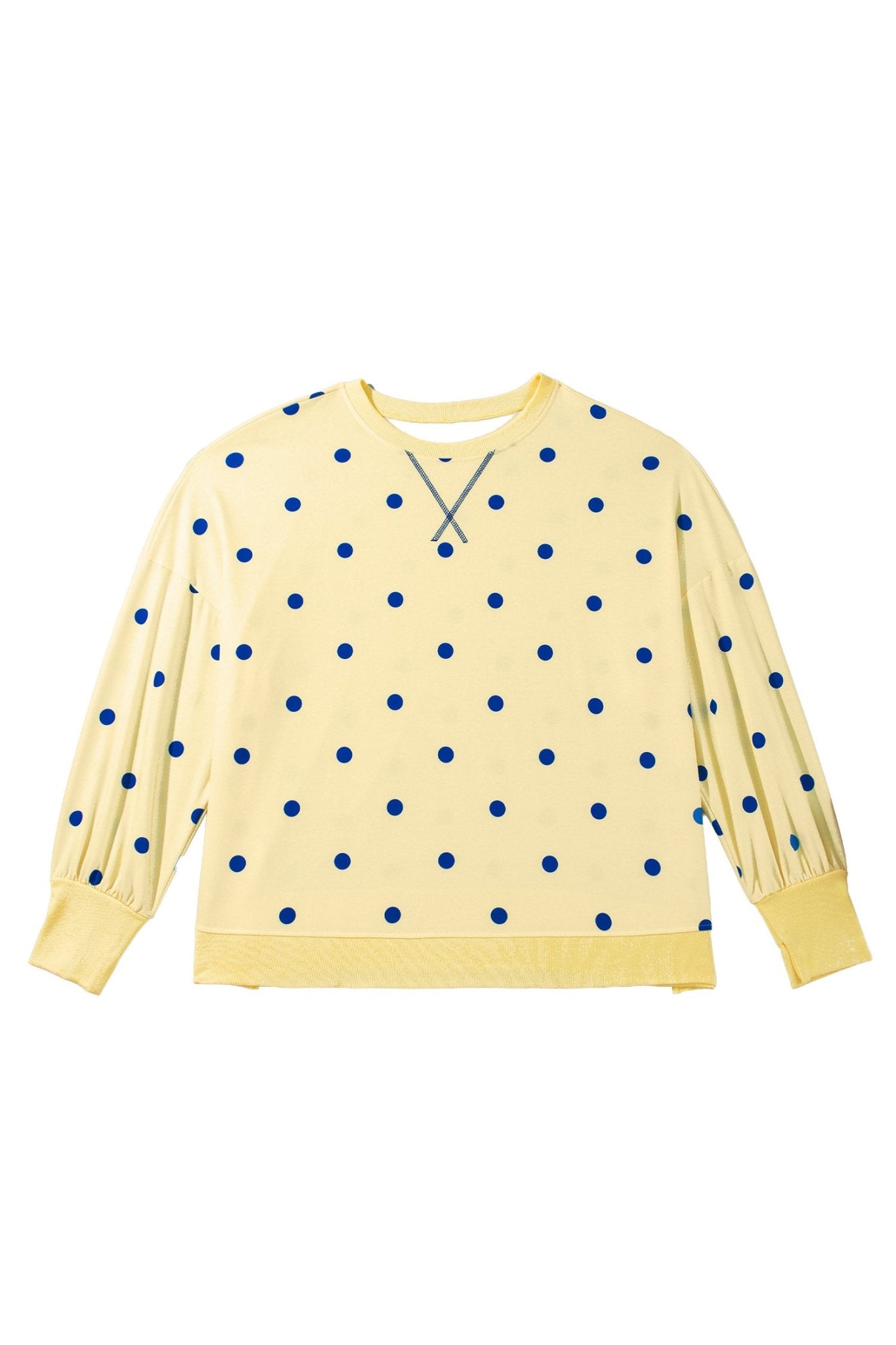 Flat lay of pale yellow blue-dot crewneck sweatshirt with balloon sleeves & ribbed trim on white background.