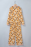 Beige Halloween pajama set with orange, black, and white jack-o'-lantern prints.