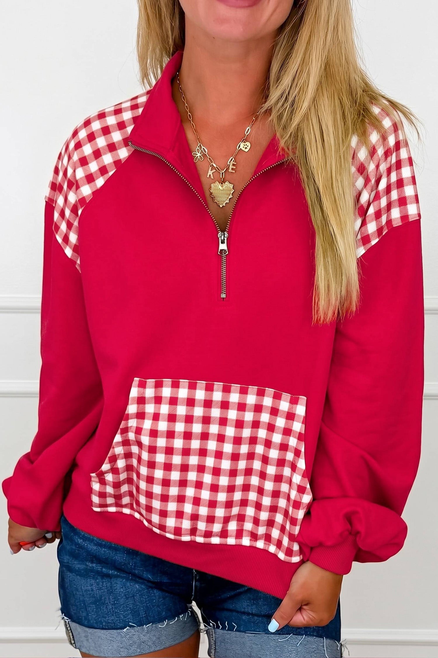Racing red gingham patchwork quarter zip sweatshirt, front view on model