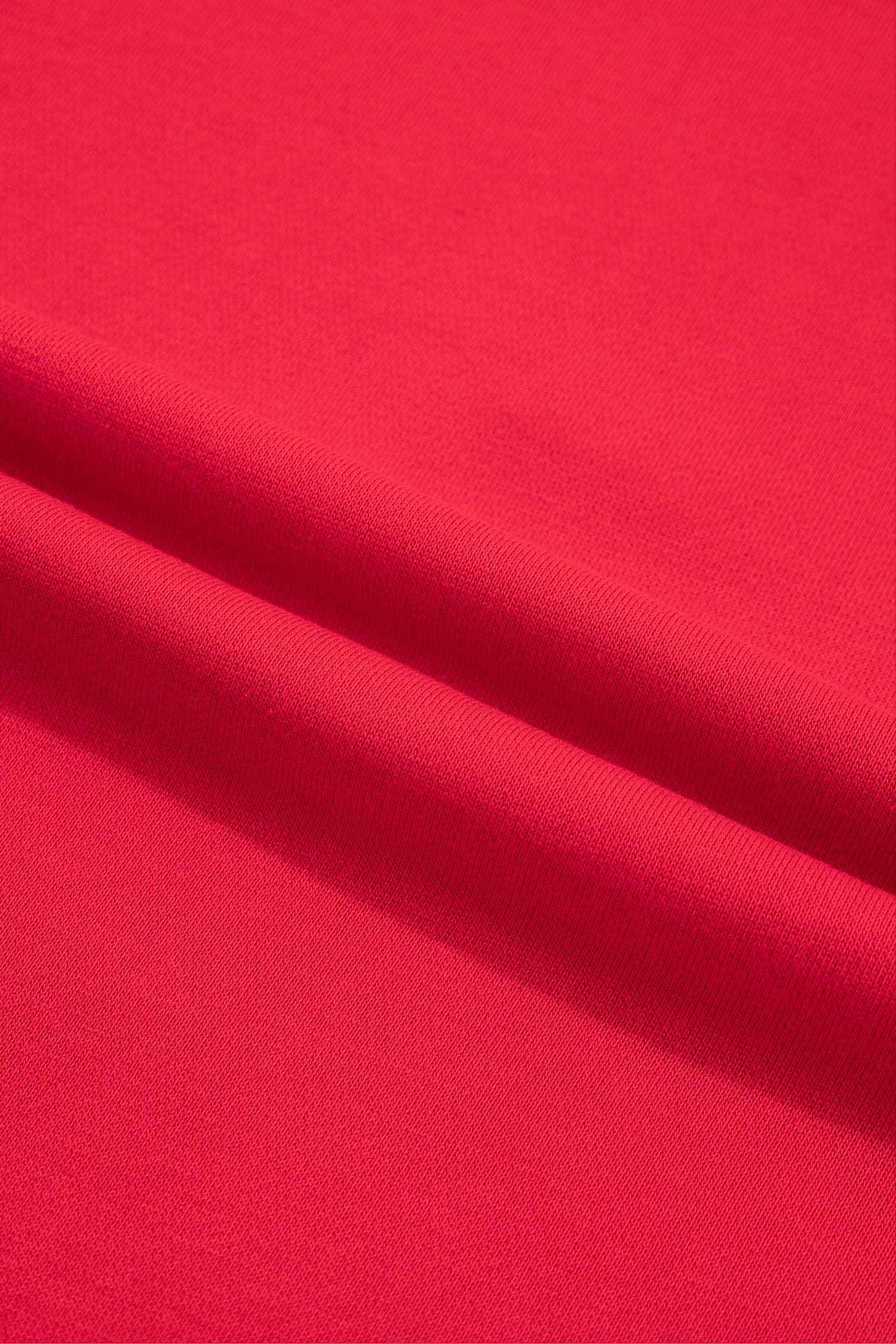Racing red cotton blend sweatshirt fabric texture, close-up