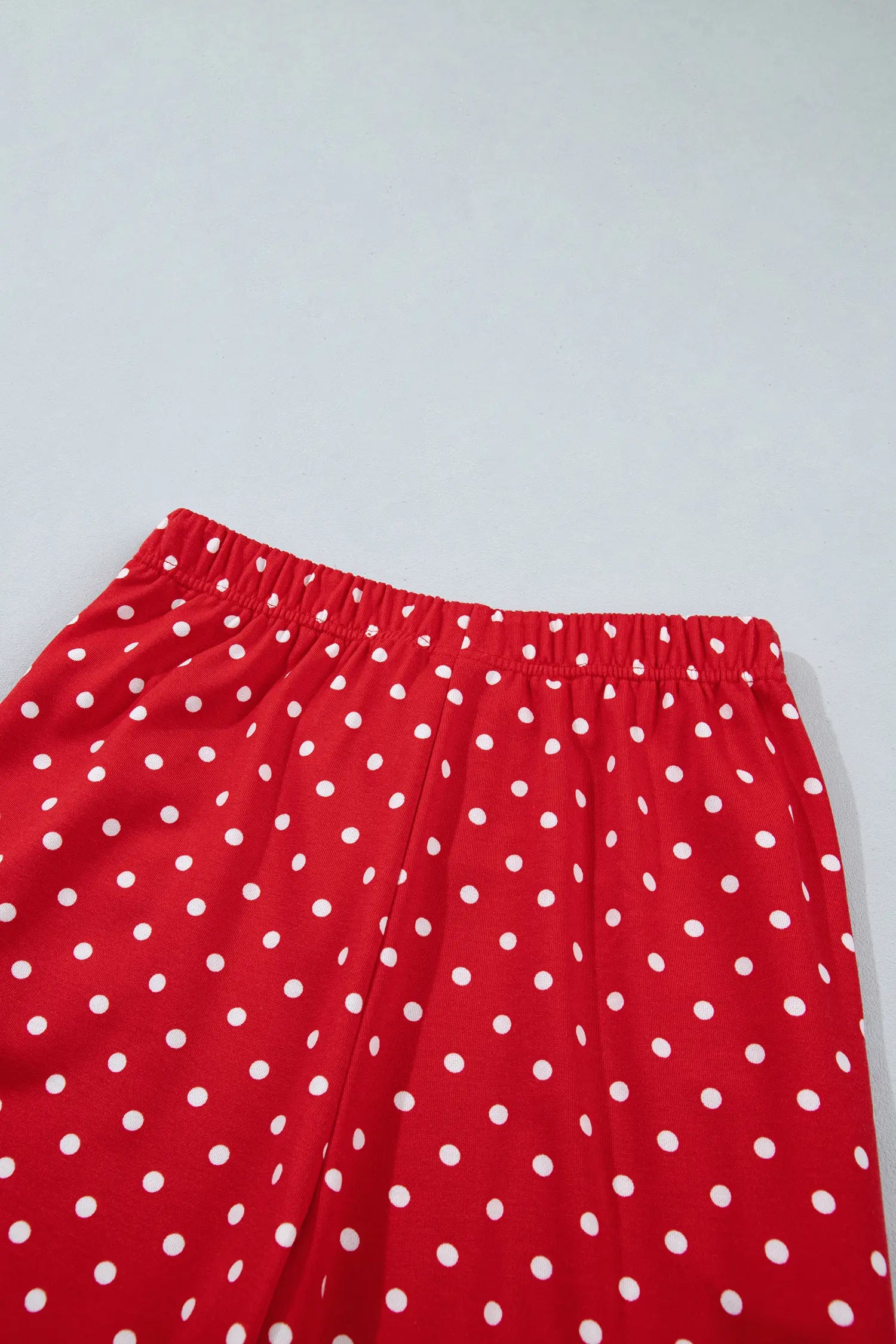 Elastic waistband on red polka dot wide leg pants