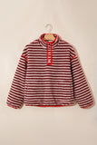 Red striped sherpa snap button stand collar pullover on a hanger, front view