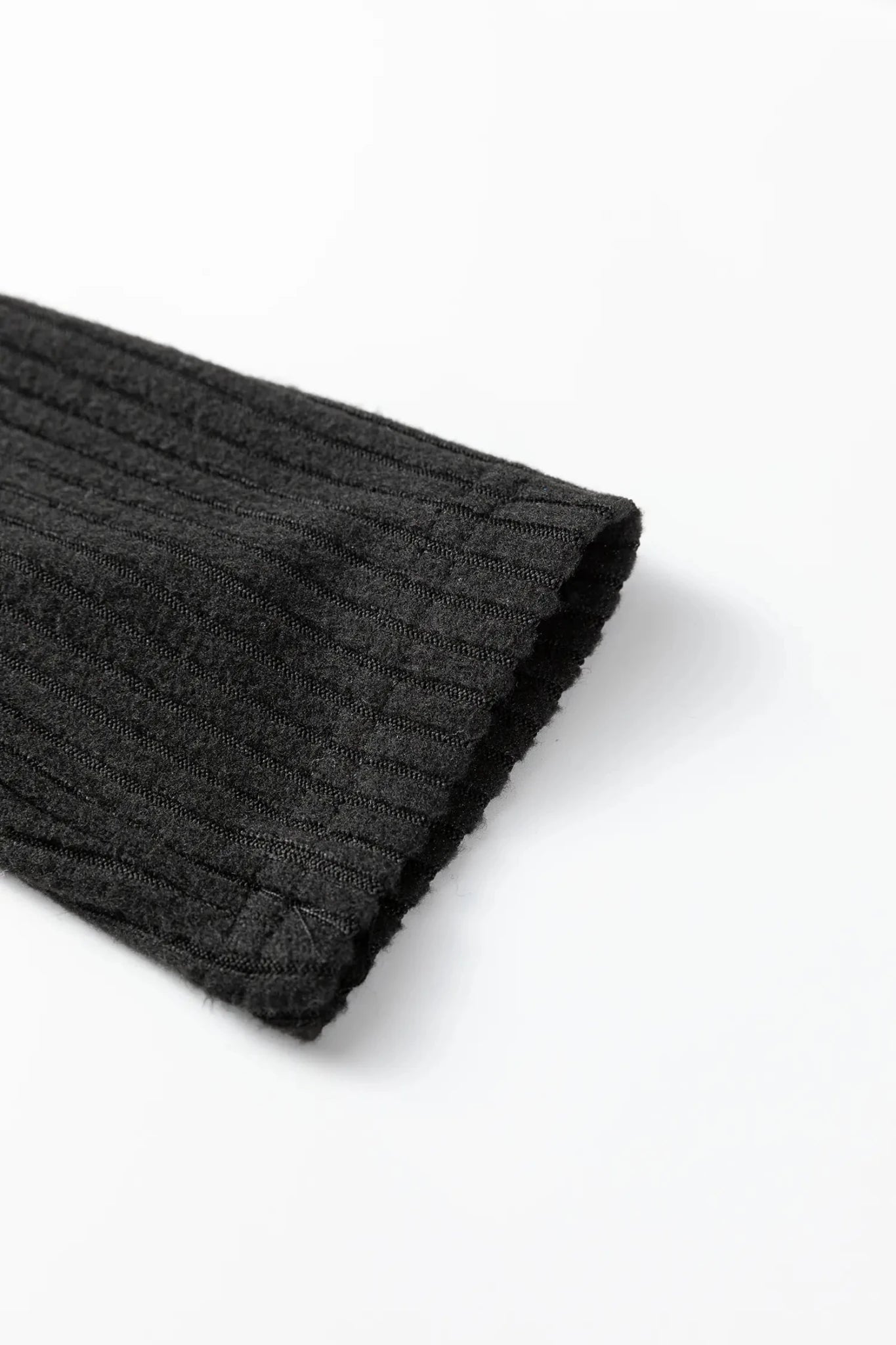 Dark gray textured fabric on a white background