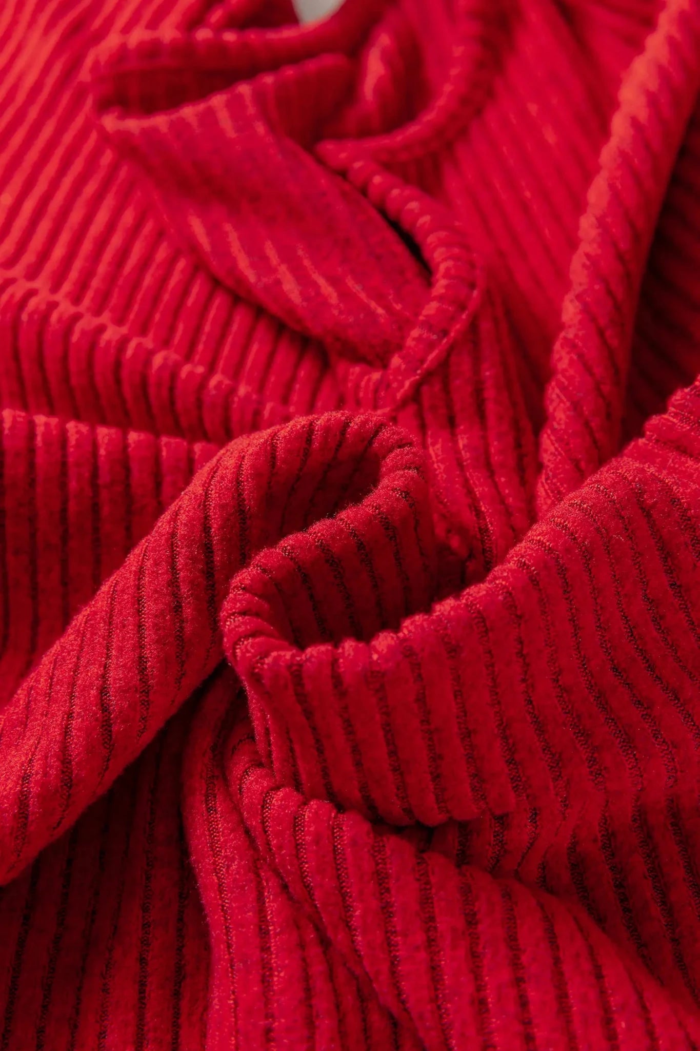 Close-up of red ribbed fabric texture