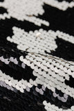 Close-up of black and white sequin fabric