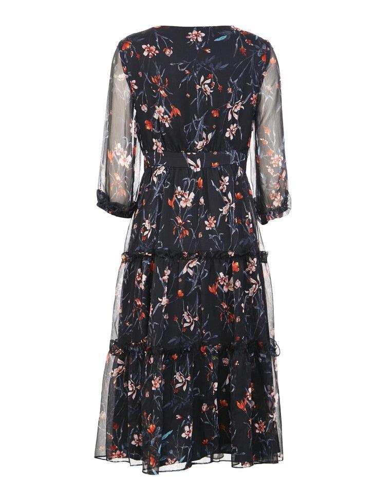 Floral dress with sheer sleeves on a white background