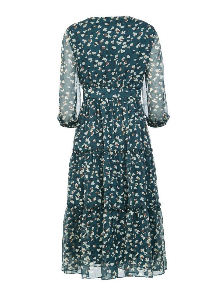 Green floral dress with sheer sleeves on a white background