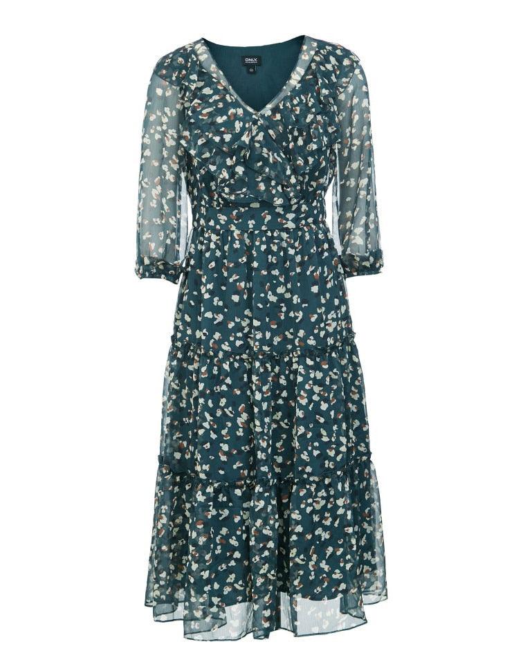 Green floral dress on a white background