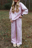 Women's pink abstract print sweatshirt and side stripe wide leg pants set, front view