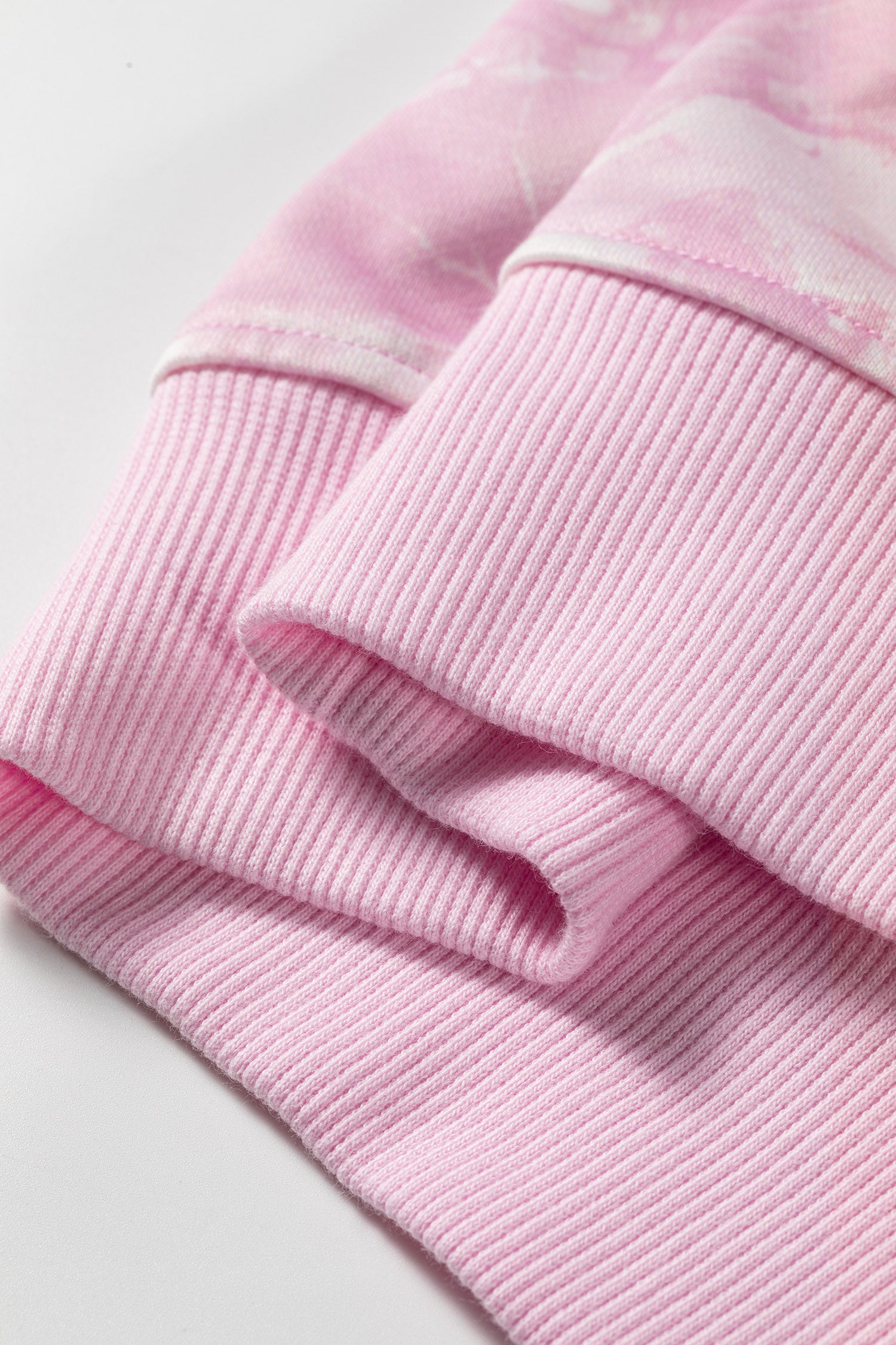 Pink sweatshirt ribbed hem and cuff detail