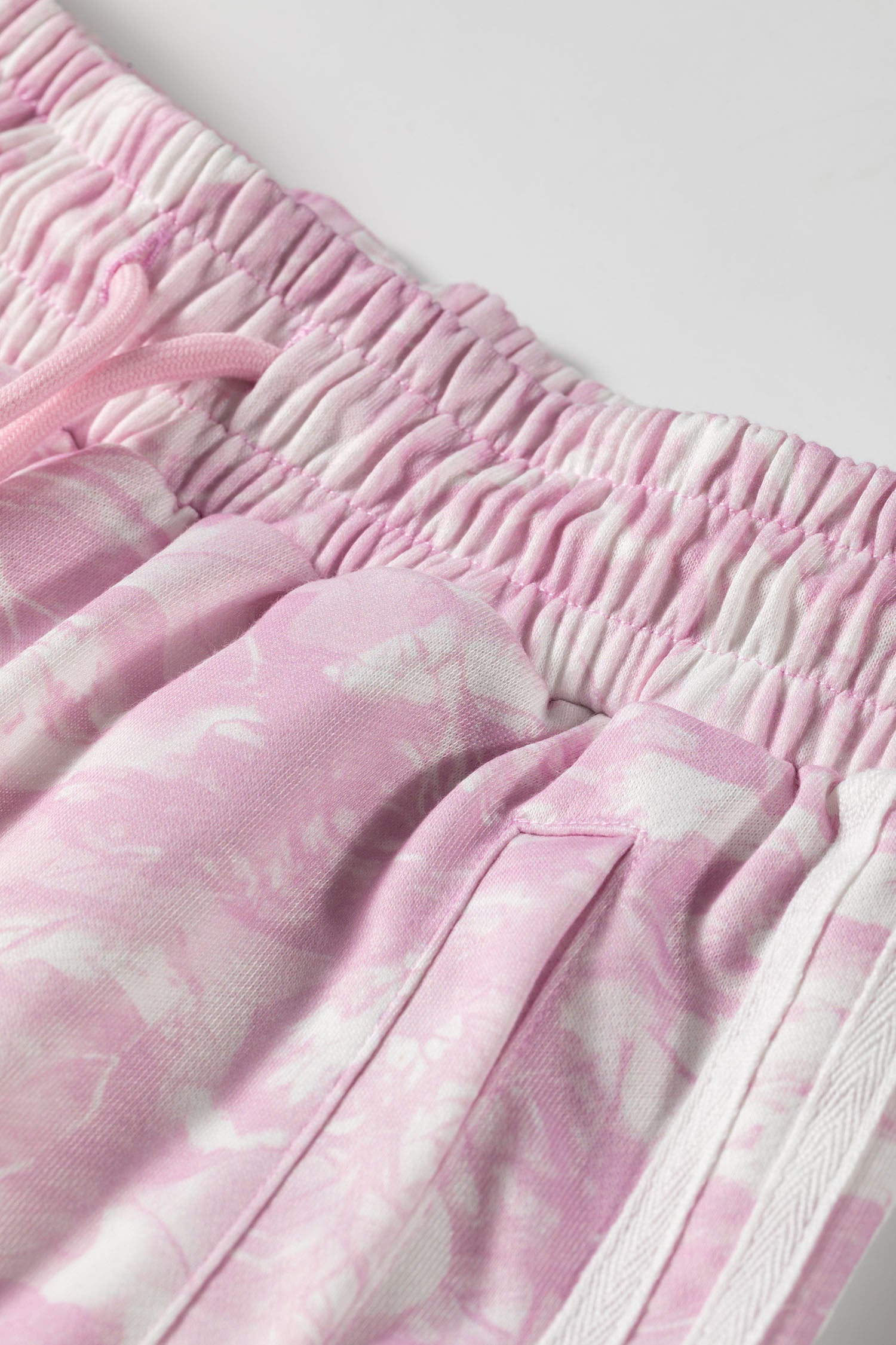 Pink wide leg pants elastic waistband and pocket detail