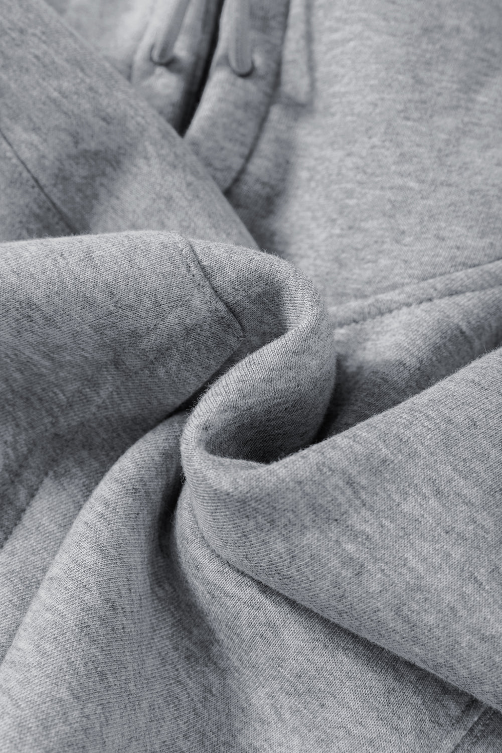 Close-up of gray fabric with folds