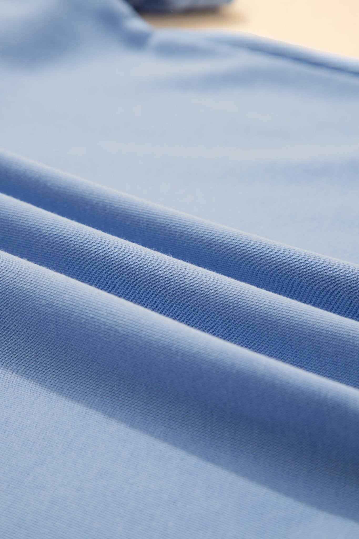 Close-up of blue fabric with a soft texture
