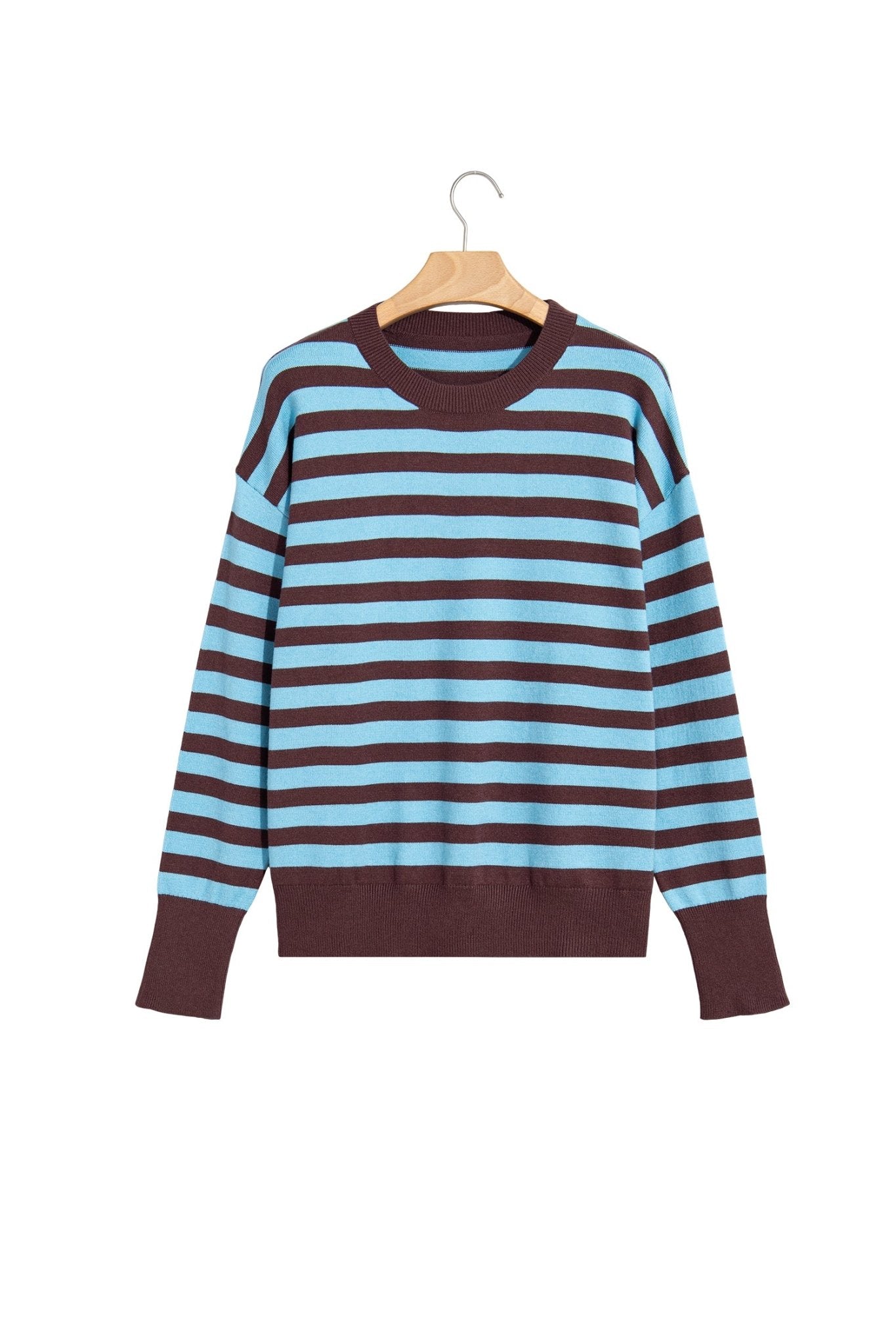 Long-sleeve crewneck sweater with light blue and dark brown horizontal stripes, hanging on a wooden hanger.
