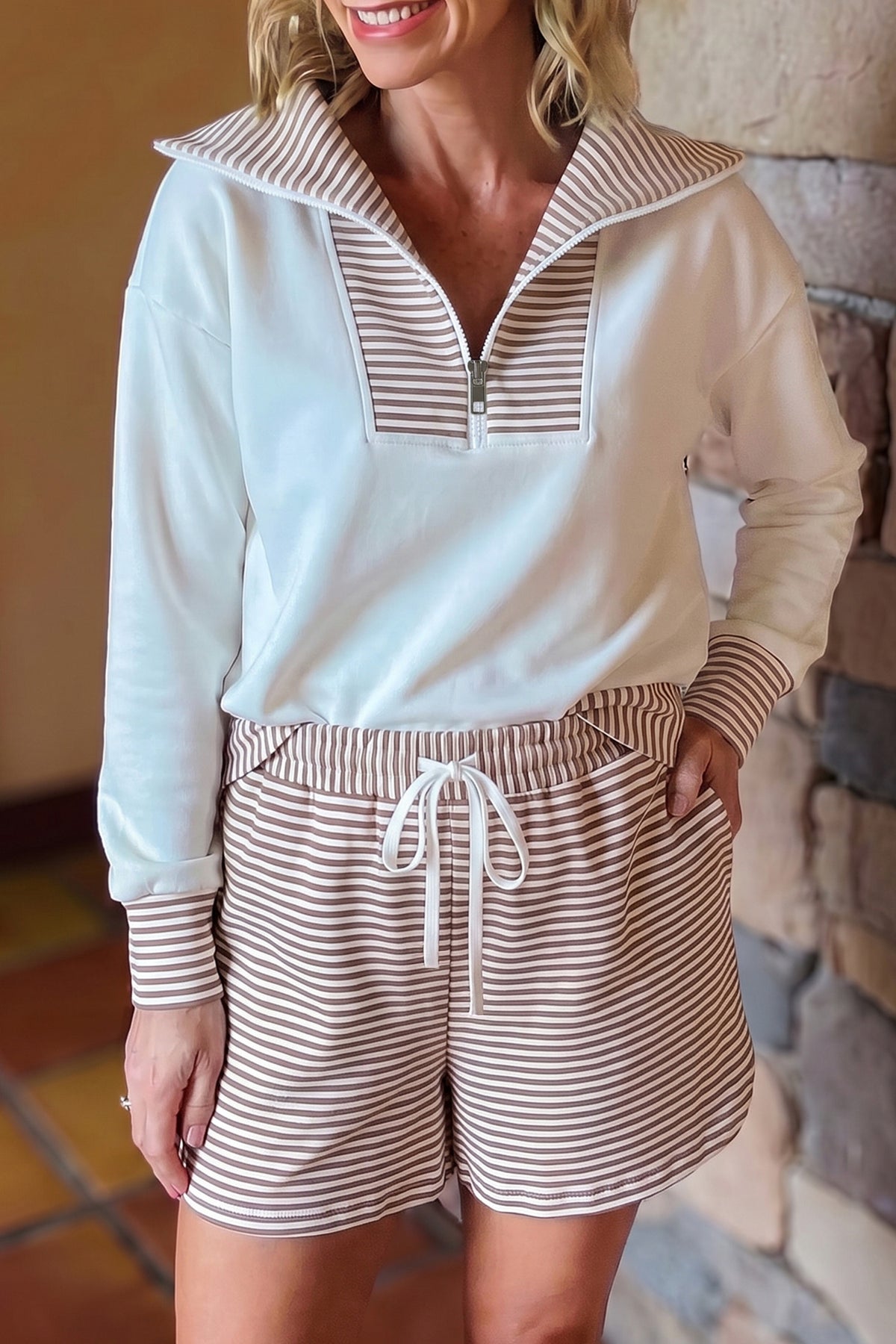 Women's white and khaki striped half zip top and drawstring shorts set, front view