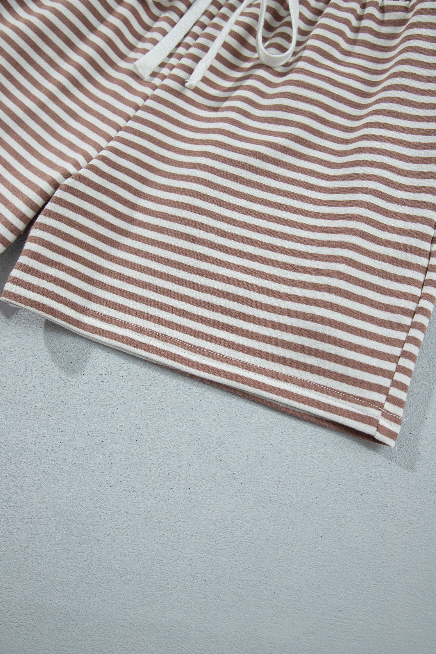 Khaki and cream striped drawstring shorts hem detail