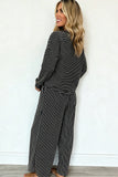 Black striped pullover and vertical stripe wide leg pants set, back view