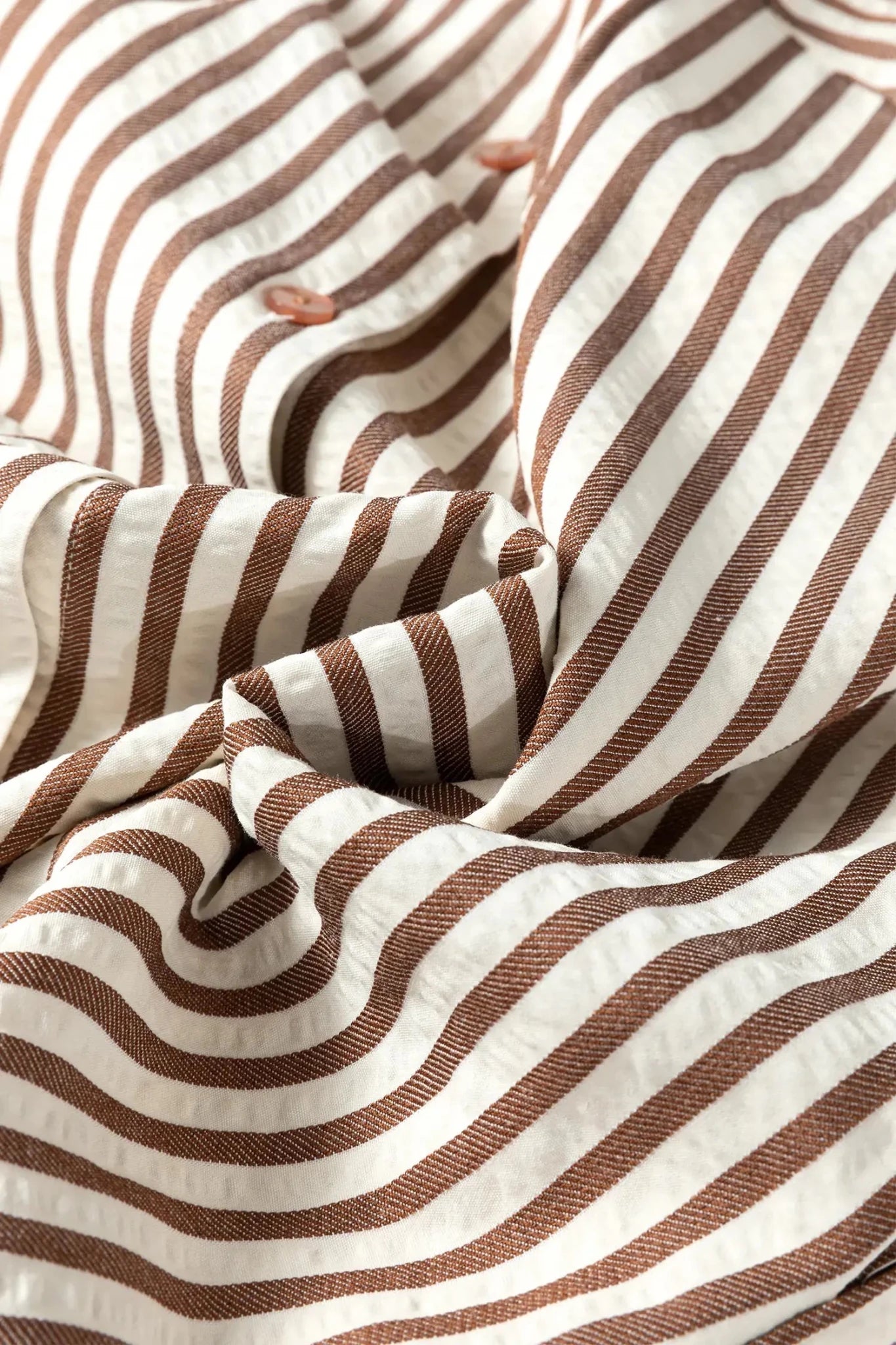 Close-up of brown and white striped fabric