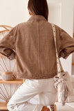 Coffee brown cropped denim jacket with center back seam, back view