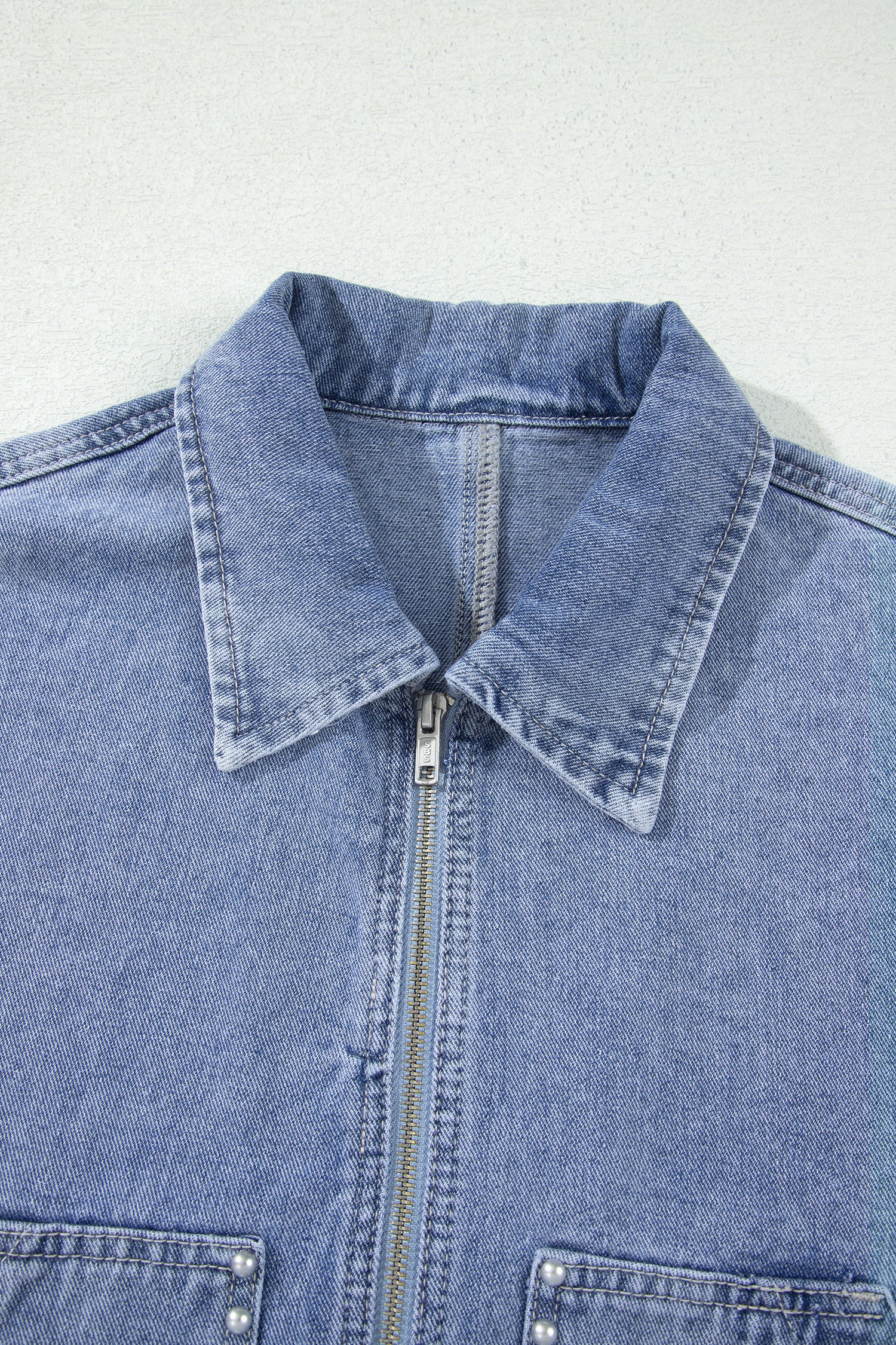 Light blue denim jacket pointed collar and metal zip front detail