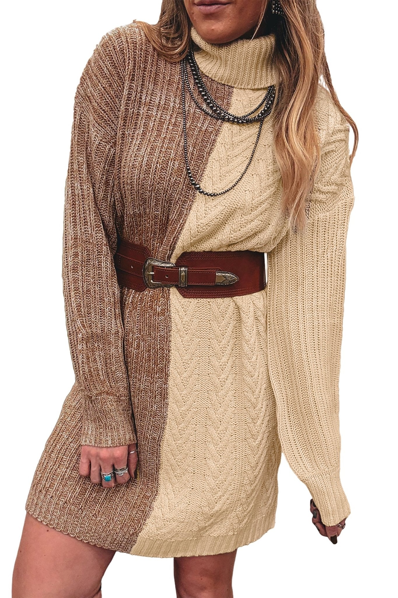 Woman in brown-cream color-block knit turtleneck dress with brown belt and silver necklaces.