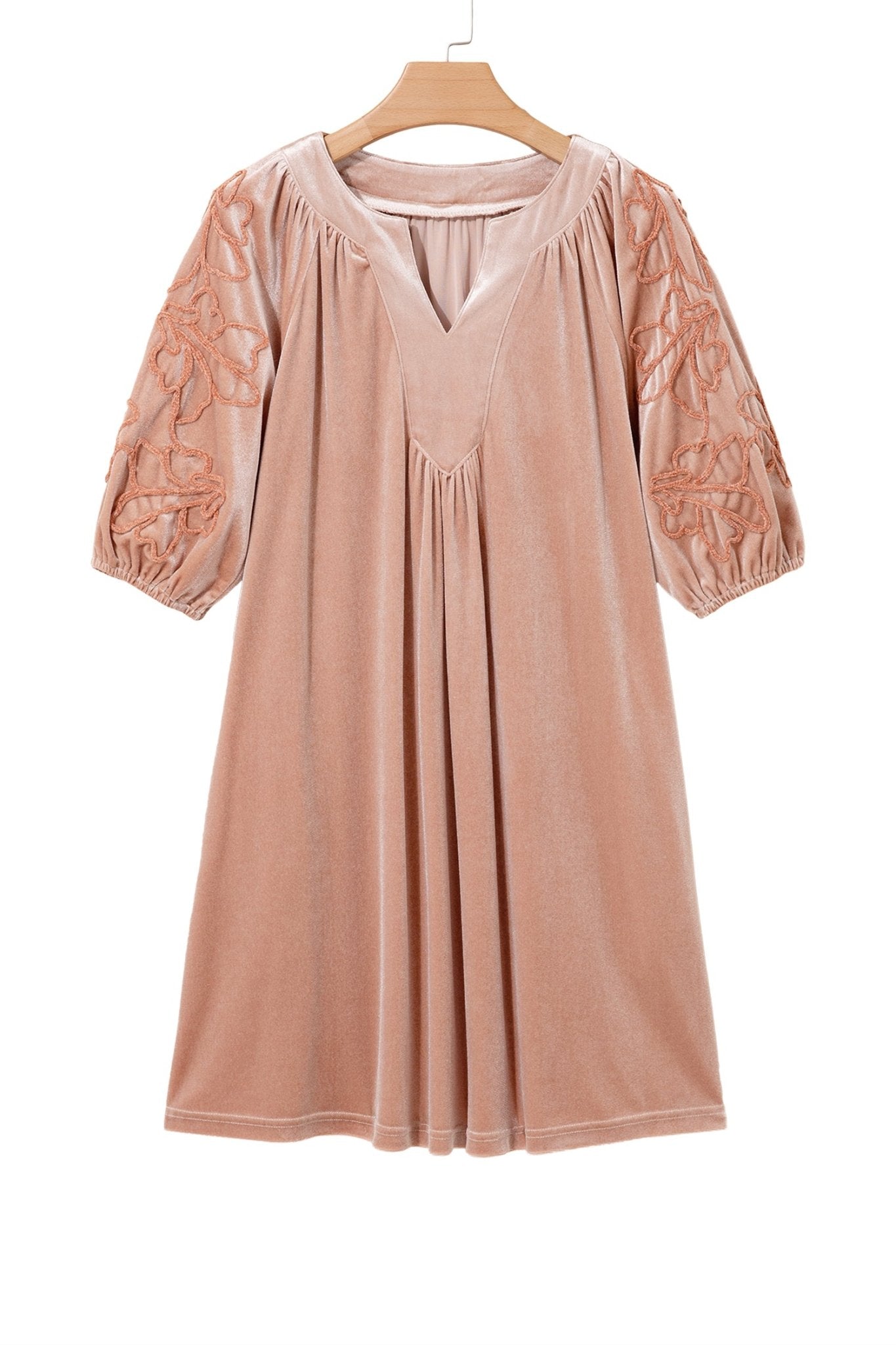 Dusty rose velvet nightgown with floral embroidered puff sleeves on hanger.