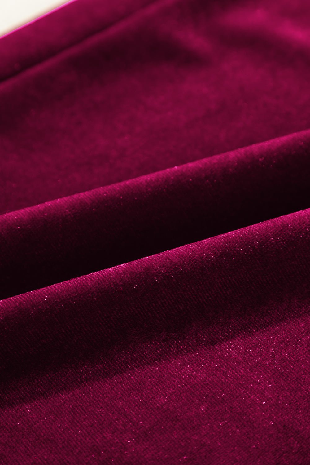 Close-up of dark purple fabric texture