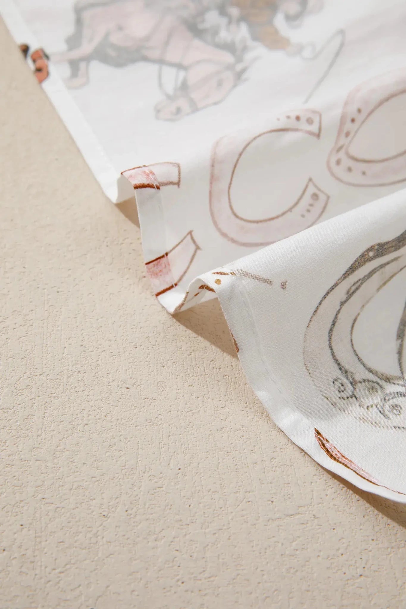 Decorative fabric with printed patterns on a textured surface