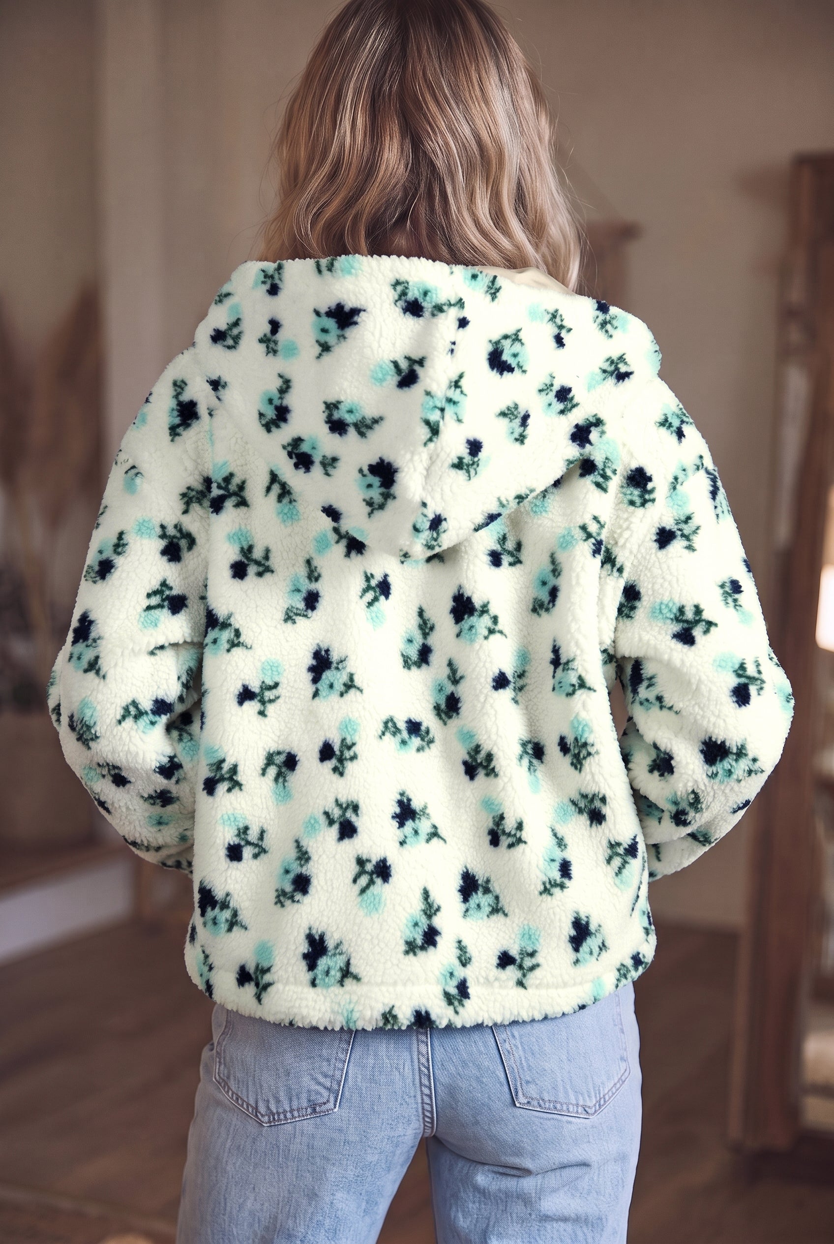 White floral faux fur hooded jacket, back view on model