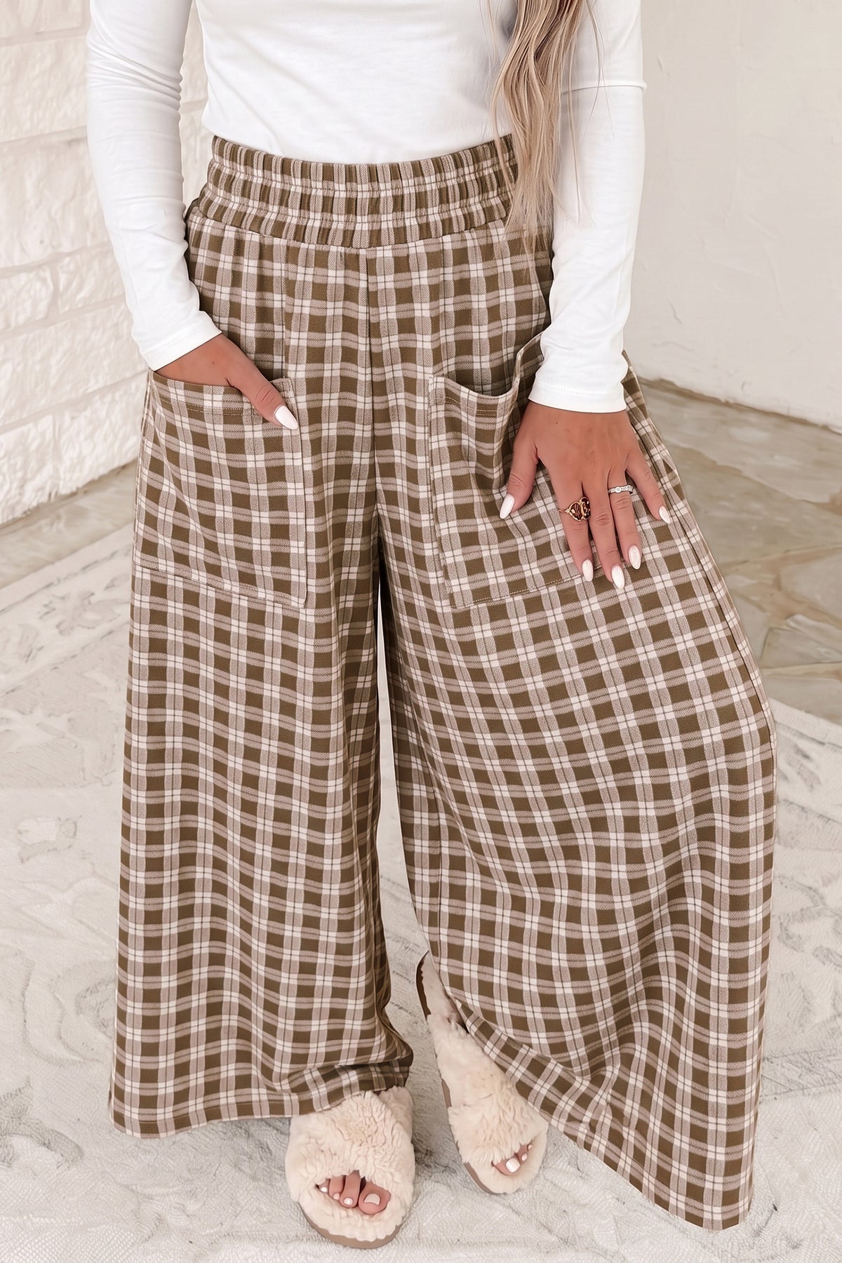 Women's brown plaid high waisted wide leg pants with elastic waist, front view