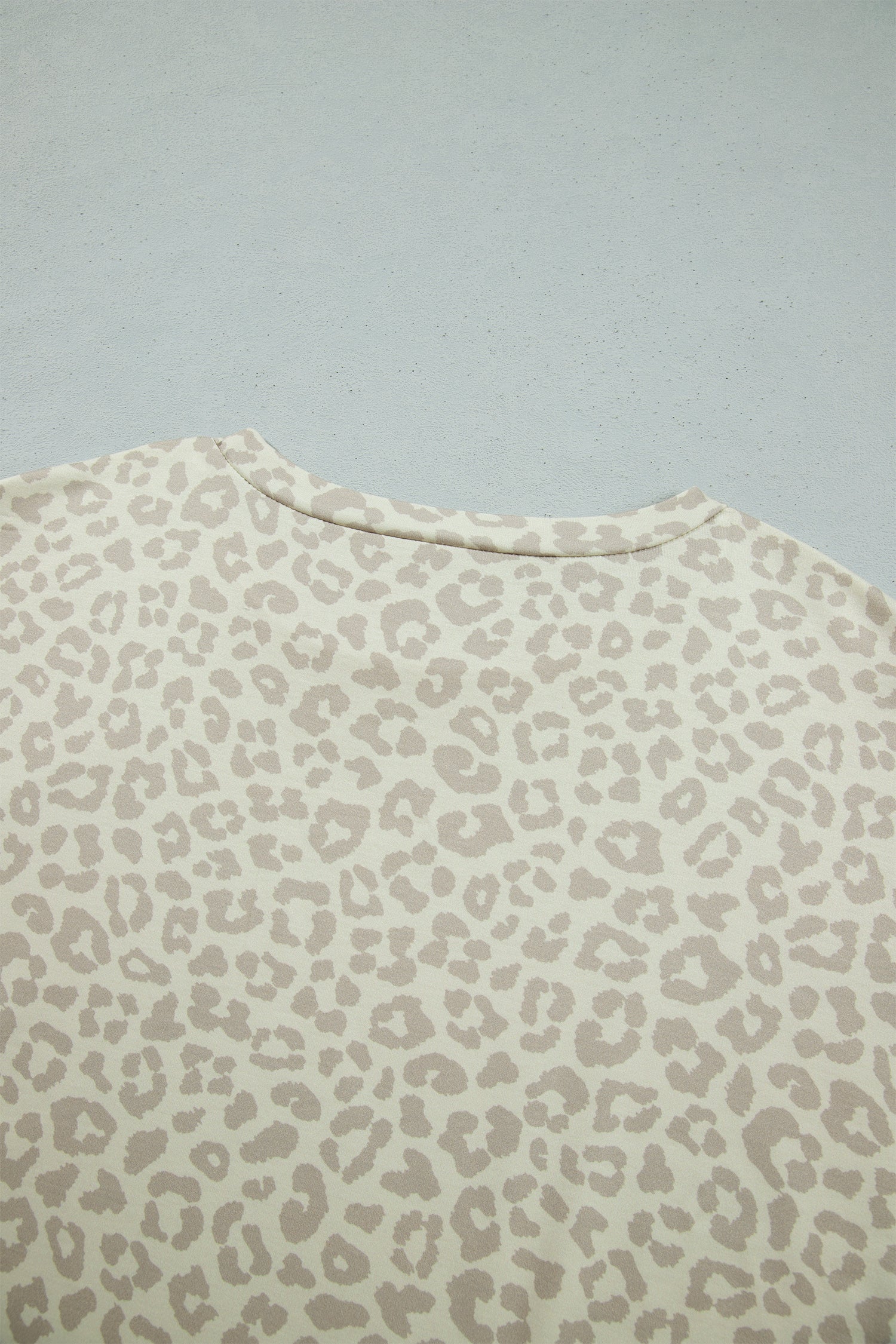 Apricot leopard print top back neckline detail