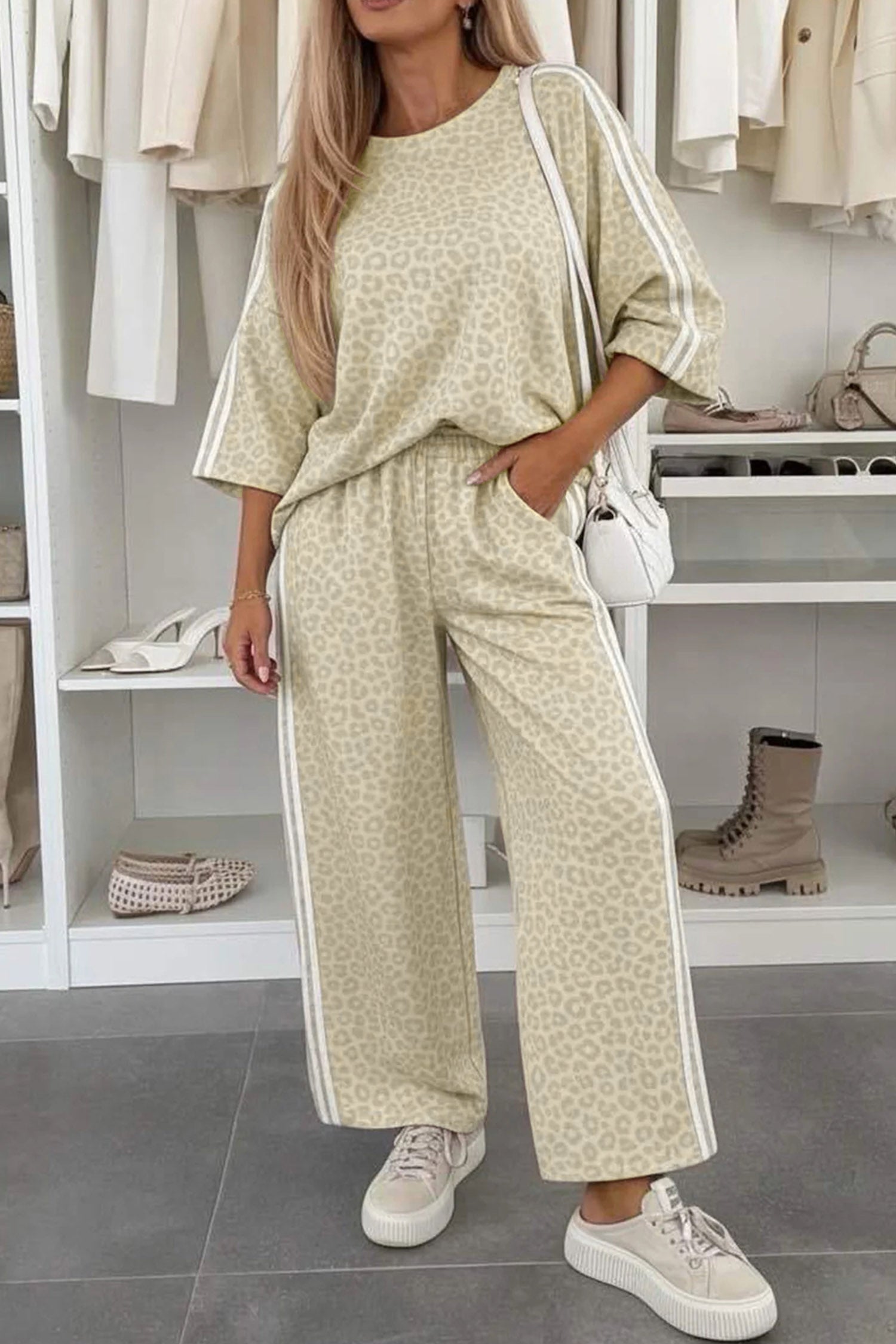 Women's apricot leopard varsity stripe set with hands in pockets