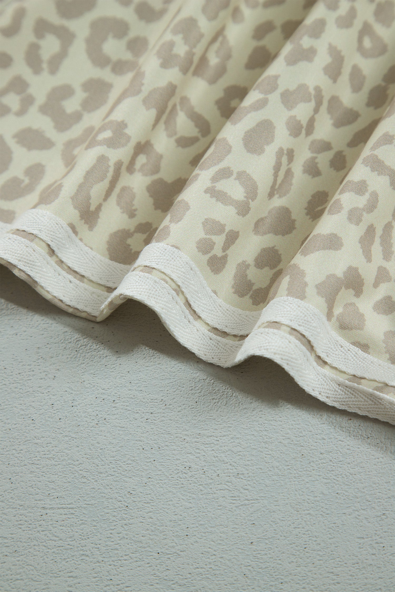Apricot leopard set hem with white varsity stripes