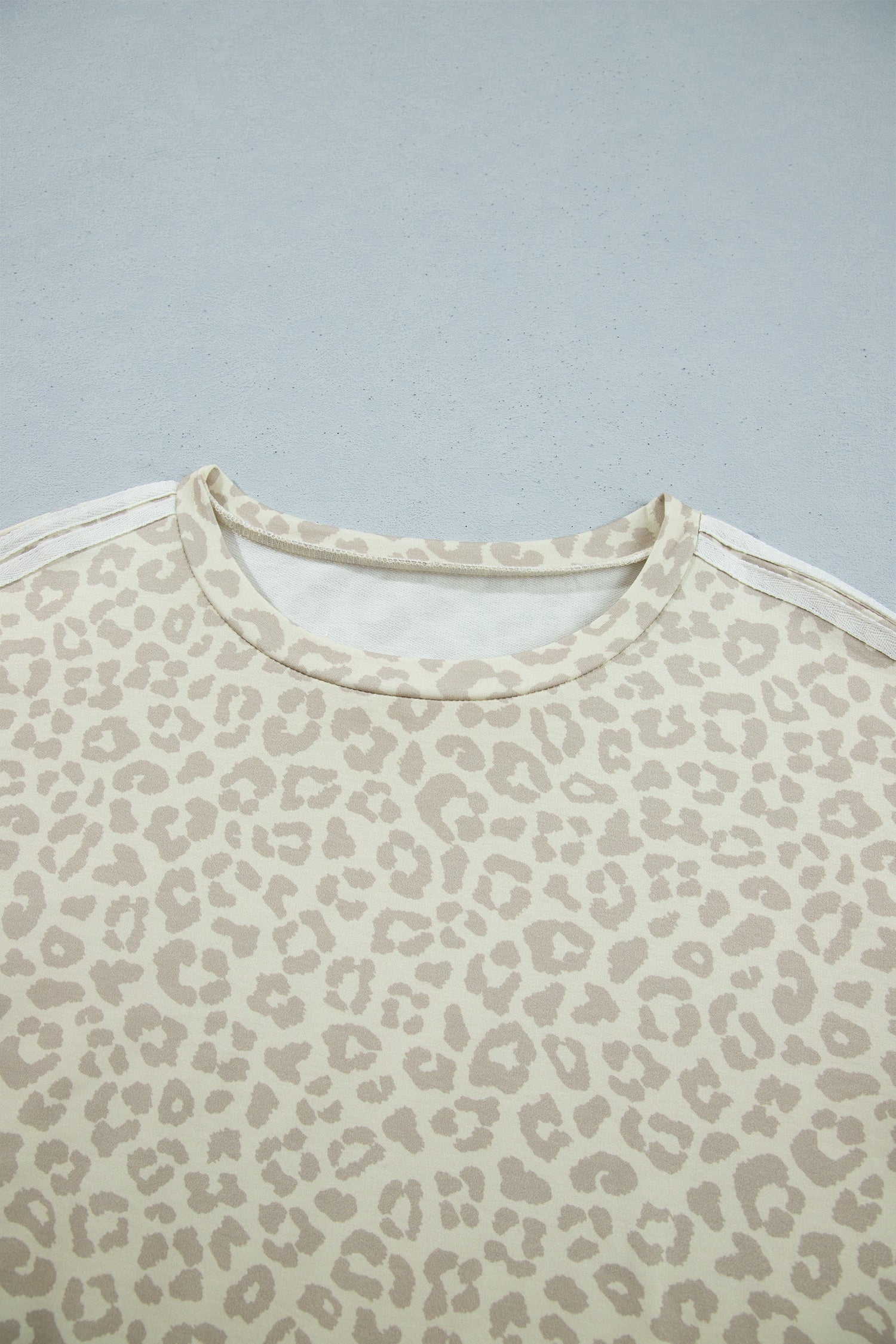 Apricot leopard print top round neckline detail