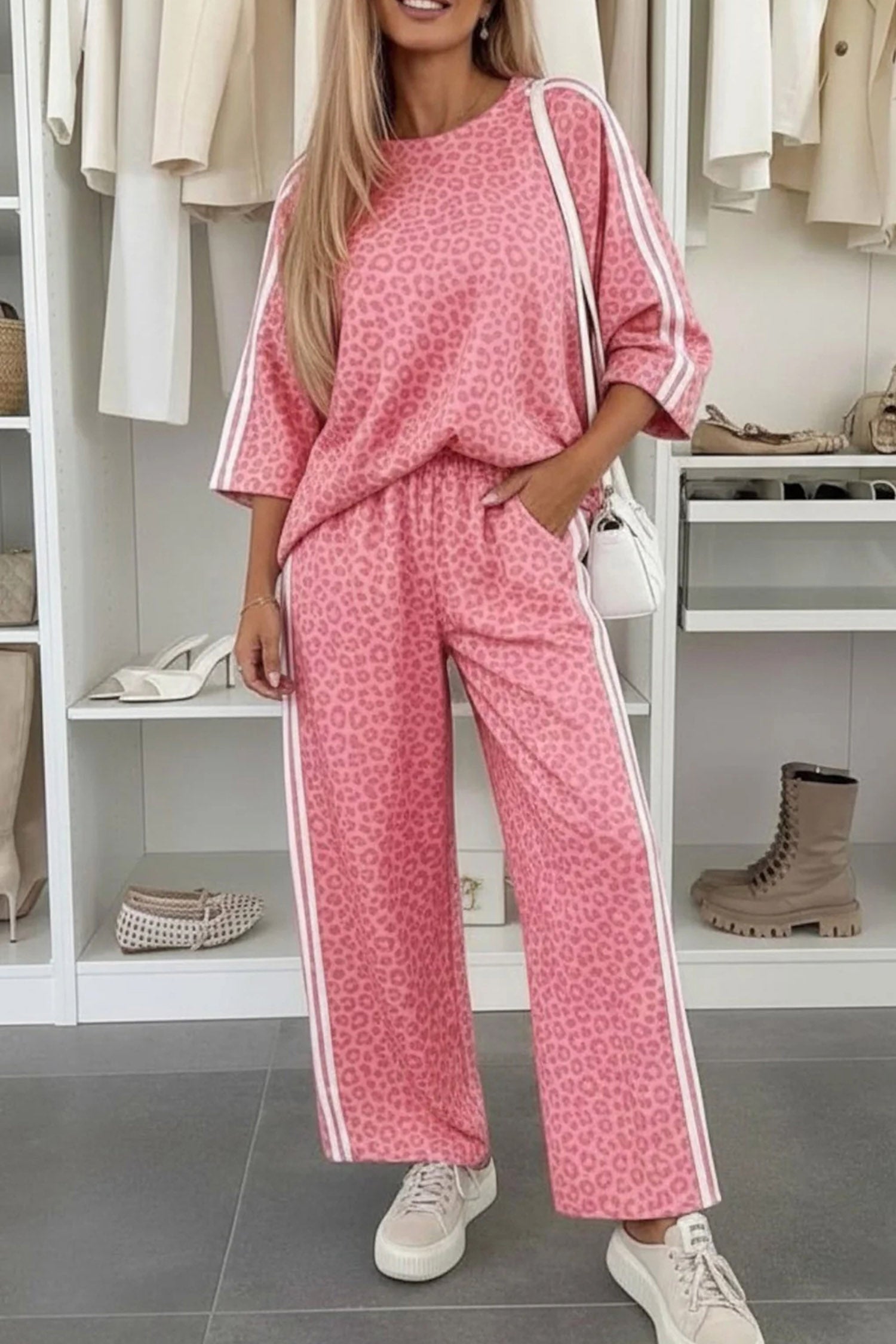 Women's pink leopard varsity stripe top and wide leg pants set, front view