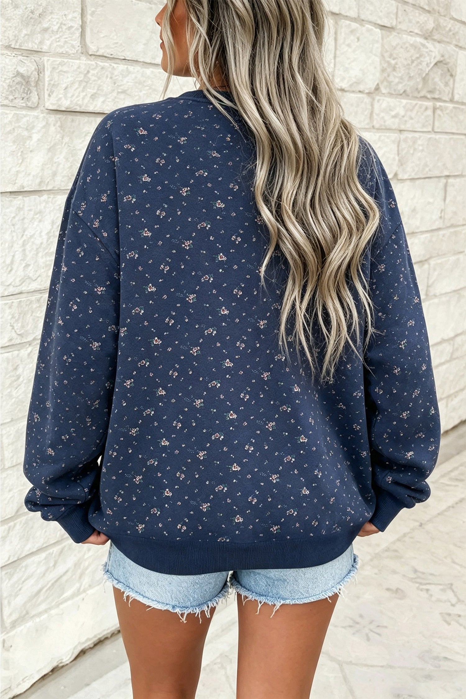 Women's navy floral print dropped shoulder sweatshirt, back view