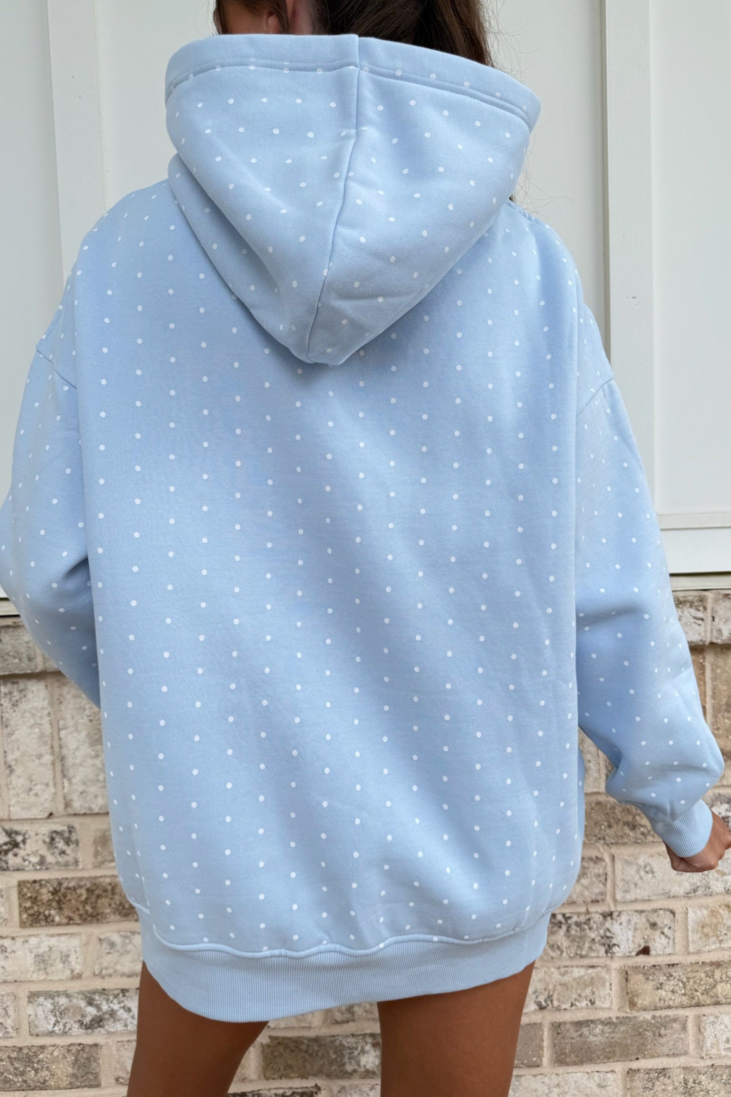 Women's sky blue polka dot oversized hoodie, back view